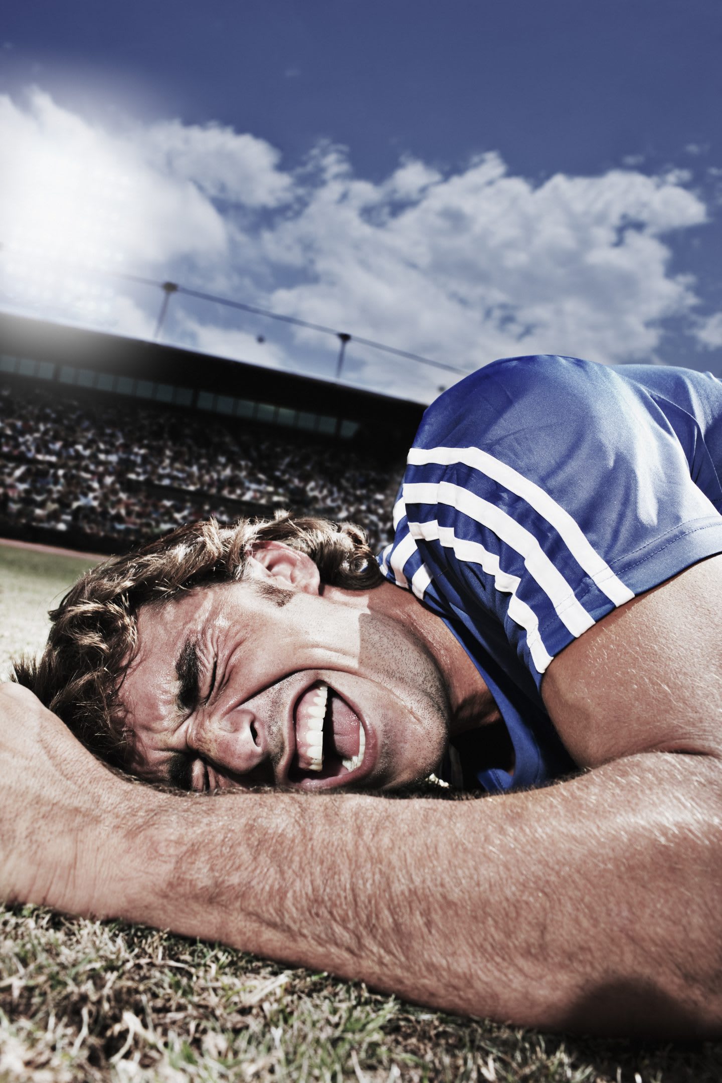 Frustrated soccer player laying on ground. soccer, pain, failure, fall, defeat, injury, GamePlan A