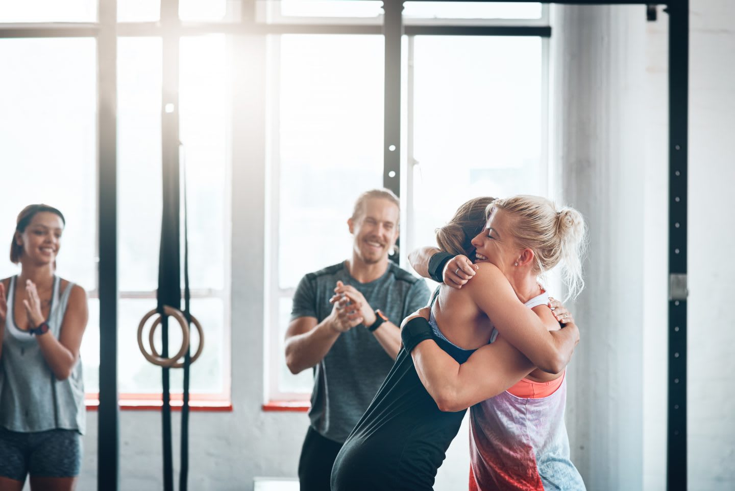 Shot of a fitness group celebrating a victory at the gym. gym, fitness, teamwork, motivation, victory