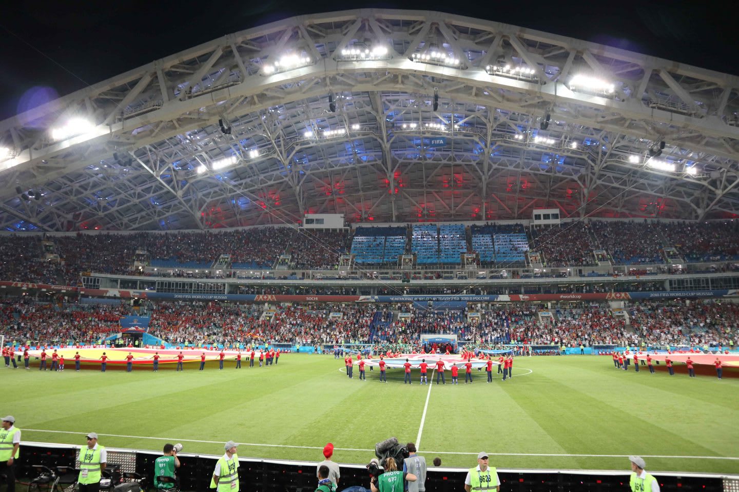 A football stadium is full with football fans for the World Cup. World Cup, football, stadium, match, pitch