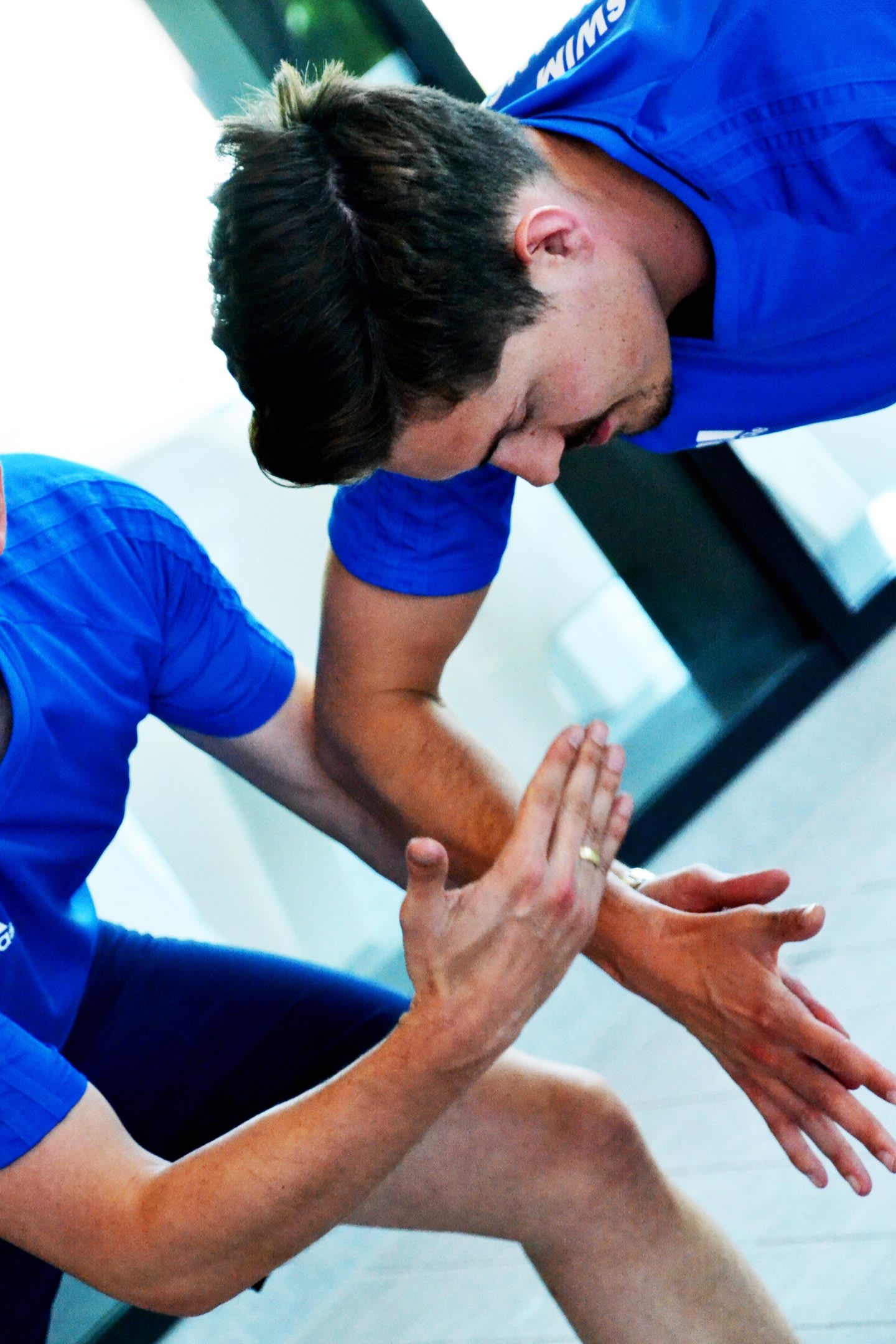 Two teammates high five. team, encouragement, teamwork, motivation