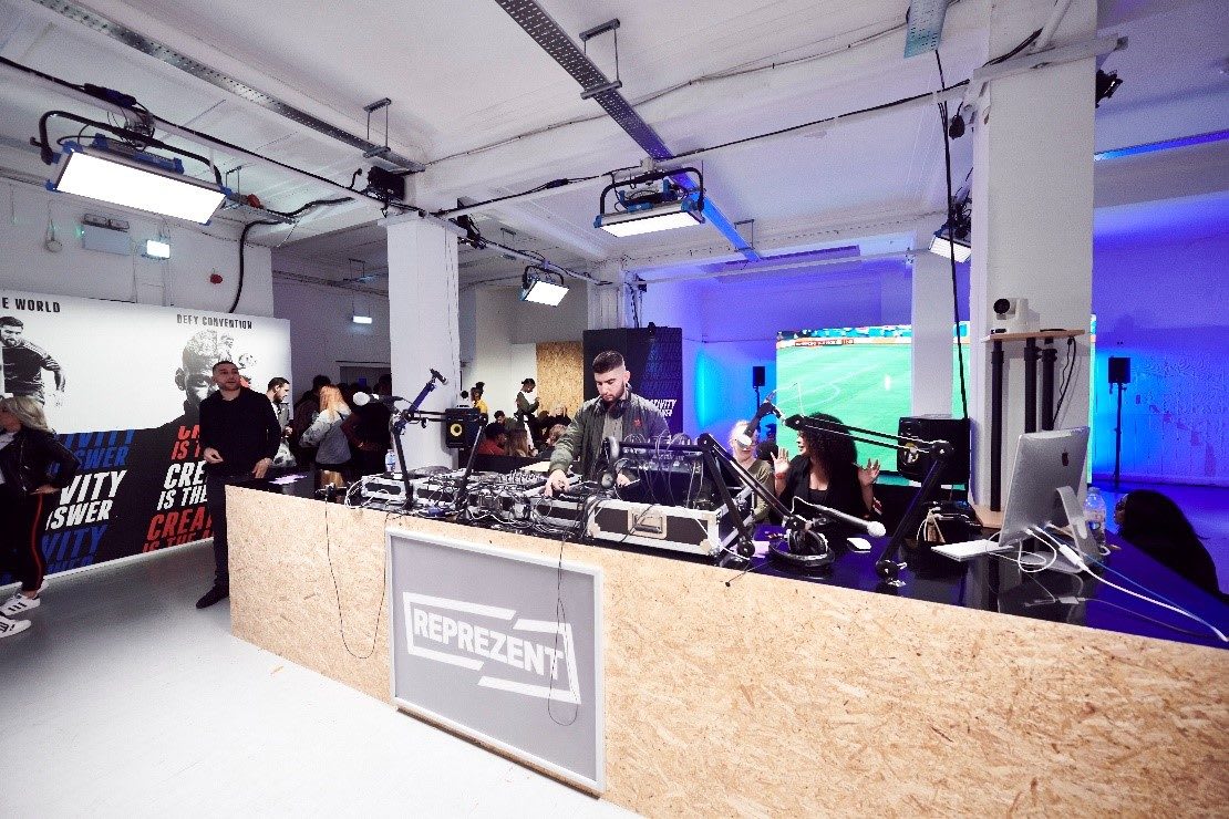 A DJ plays music in a gritty street building. music, dj, music, radio
