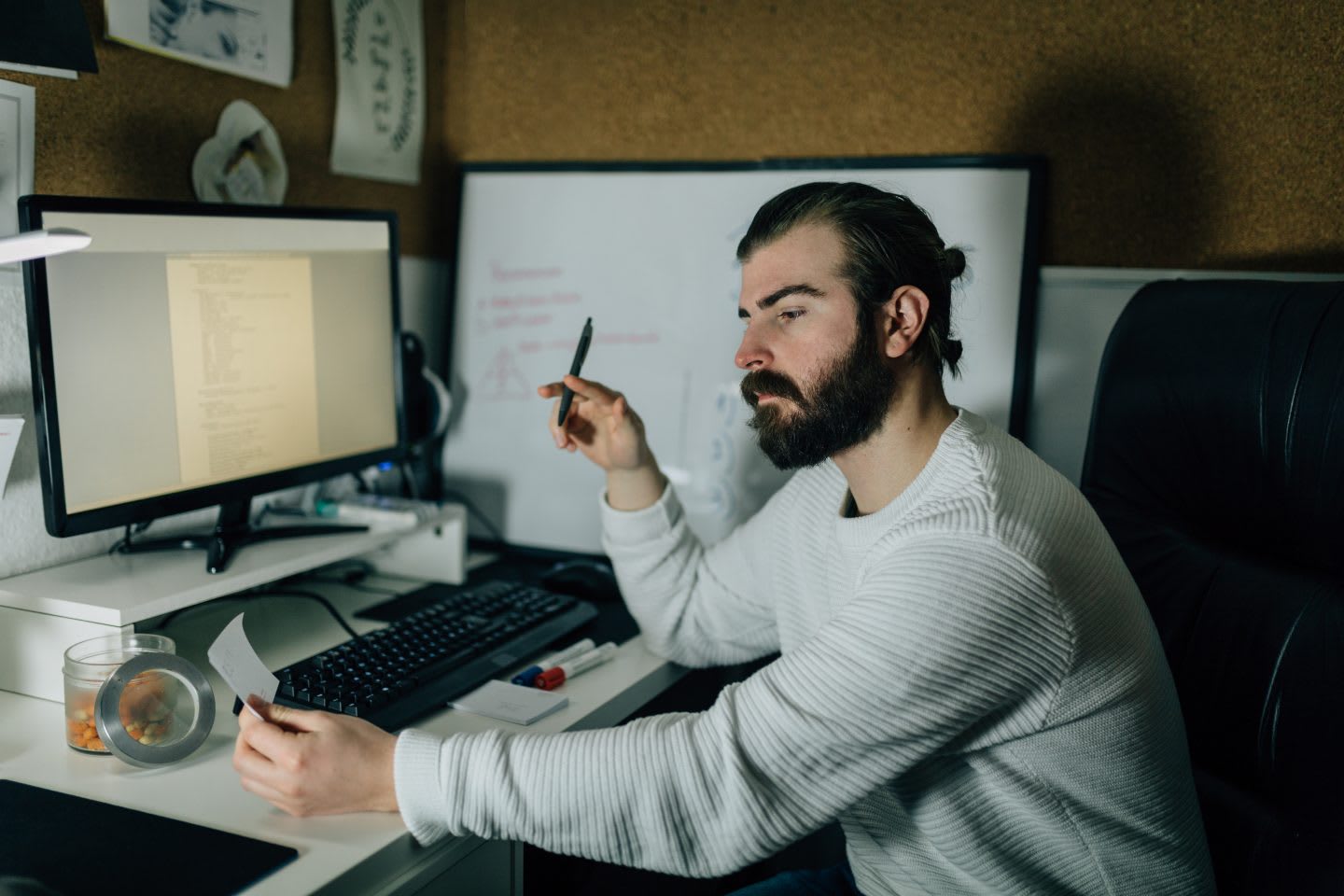 Man working from home and using computer