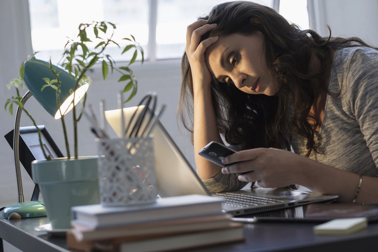 Businesswoman using technology in office
