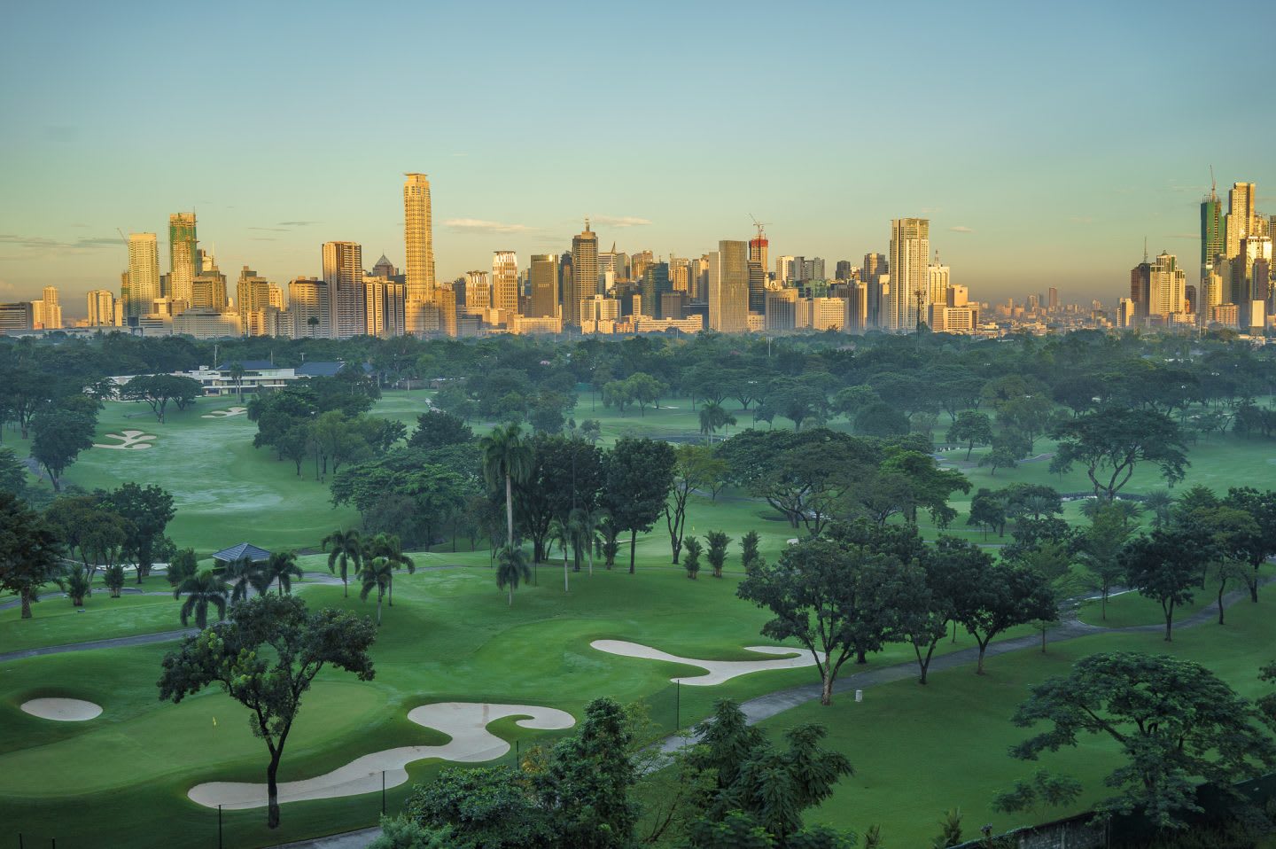 Golf course and city against blue sky, golf, golf course, skyline, sport, GamePlan A