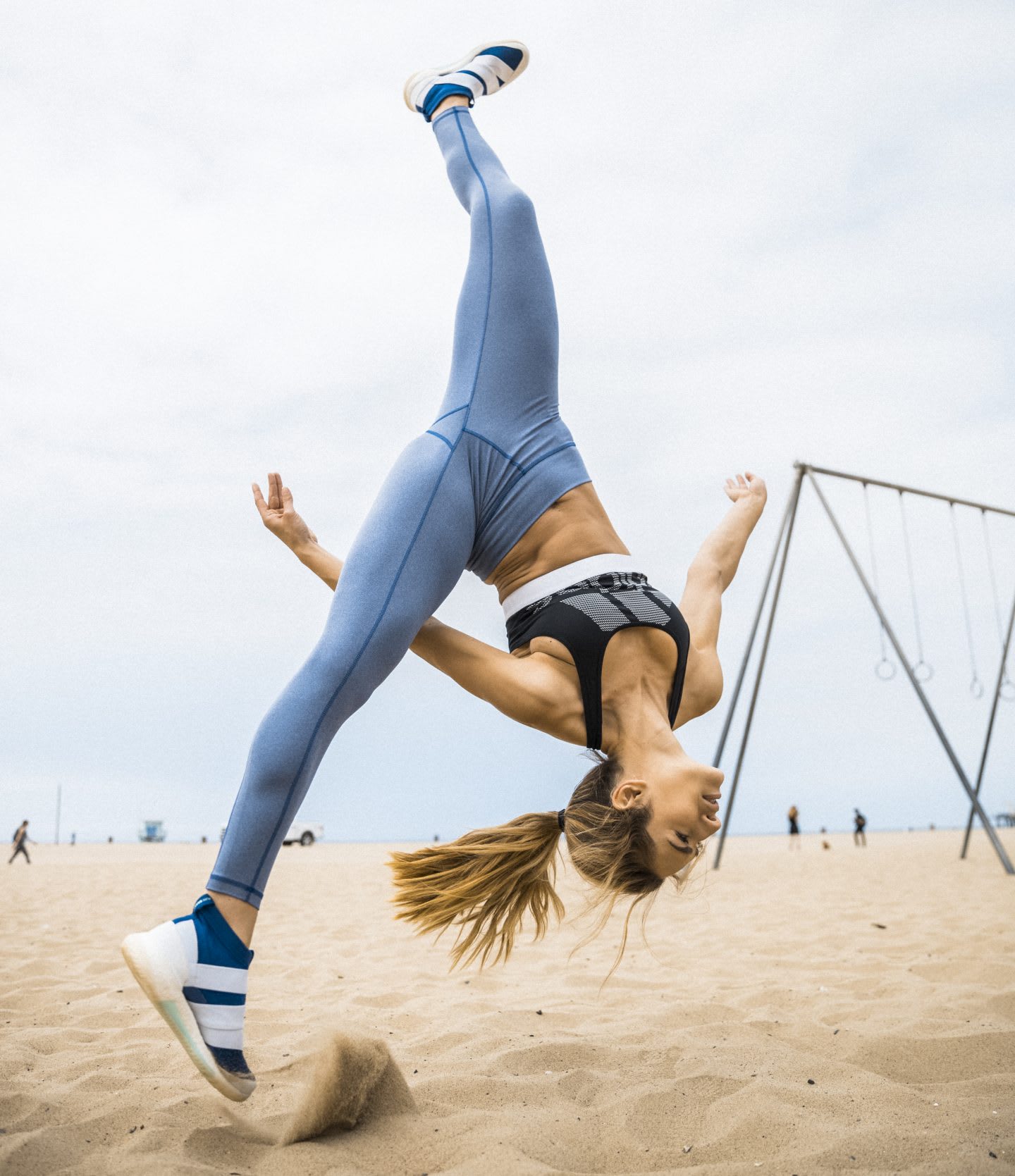 Woman doing a cartwheel showing body tension and bursting of energy, motivation, boost your performance, gymnastics, adidas, GamePlan A