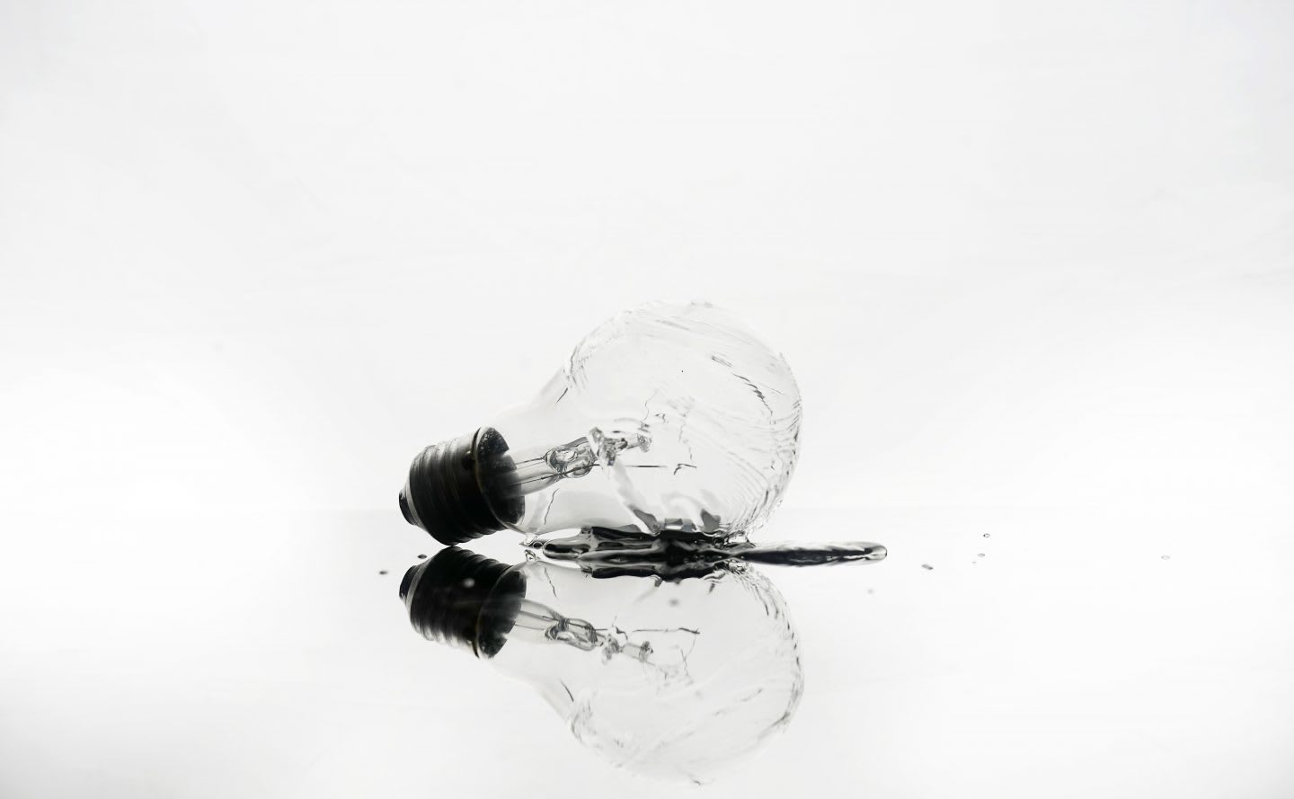 Creative light bulb and splash water on background, ideas, brainstorming, inspiration, enlightenment, creativity, GamePlan A