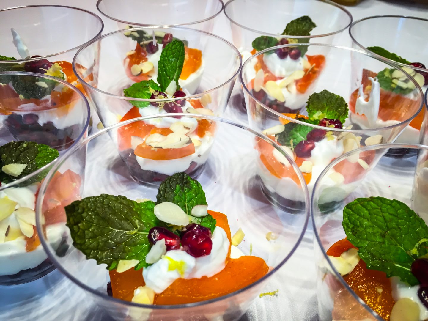 Persimmon fruit parfait served in nice glasses, holiday recipes, festive, dessert