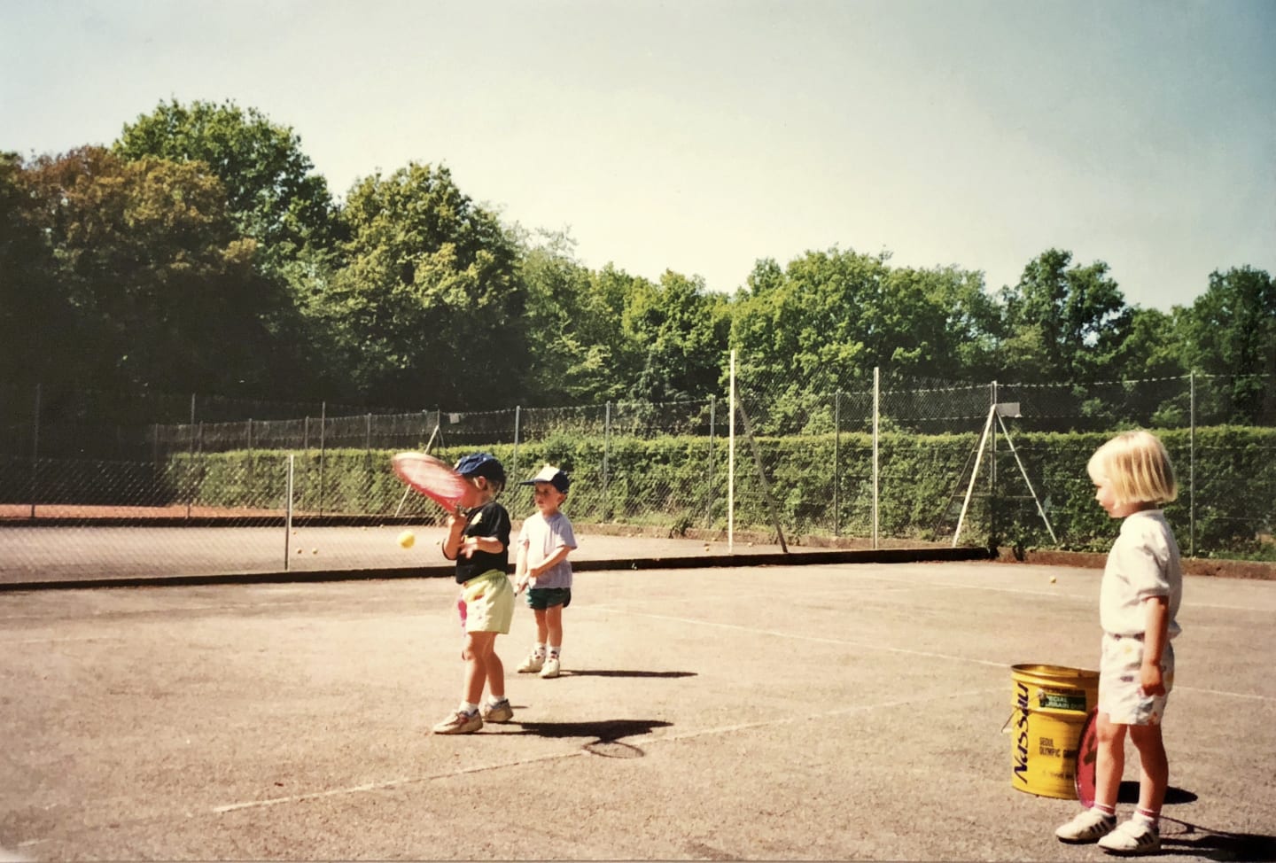 Children playing tennis outside, young, children, tennis, sports, active, GamePlan A