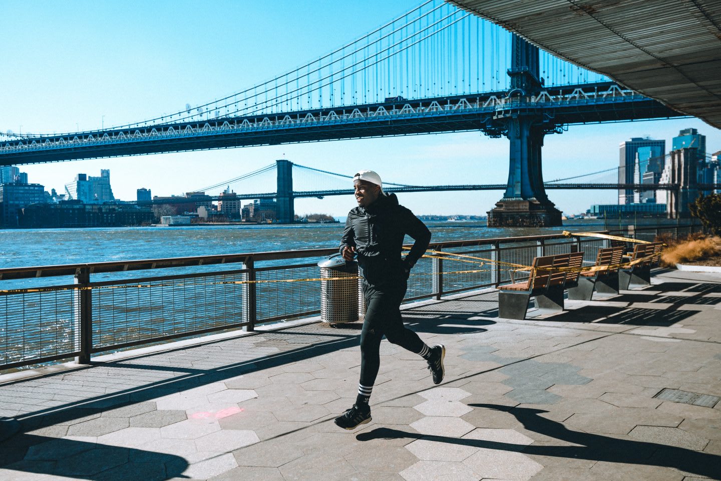 Man running along the Hudson River in New York City with sunny weather. City running, marathon training, mindset, inspiration, GamePlan A.