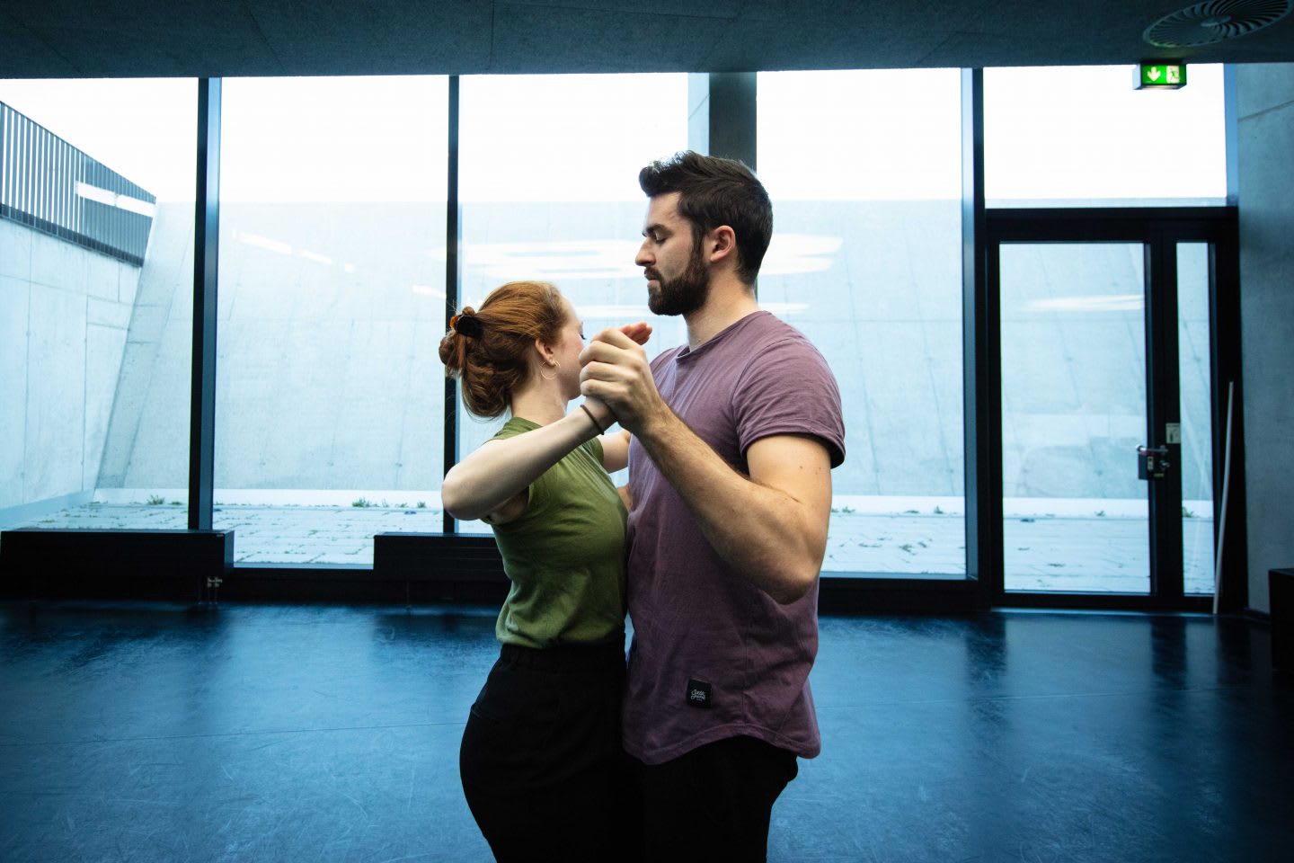 A couple in dancing posture with closed eyes. Followership, leadership, partner dance, collaboration, listening, trust, GamePlan A