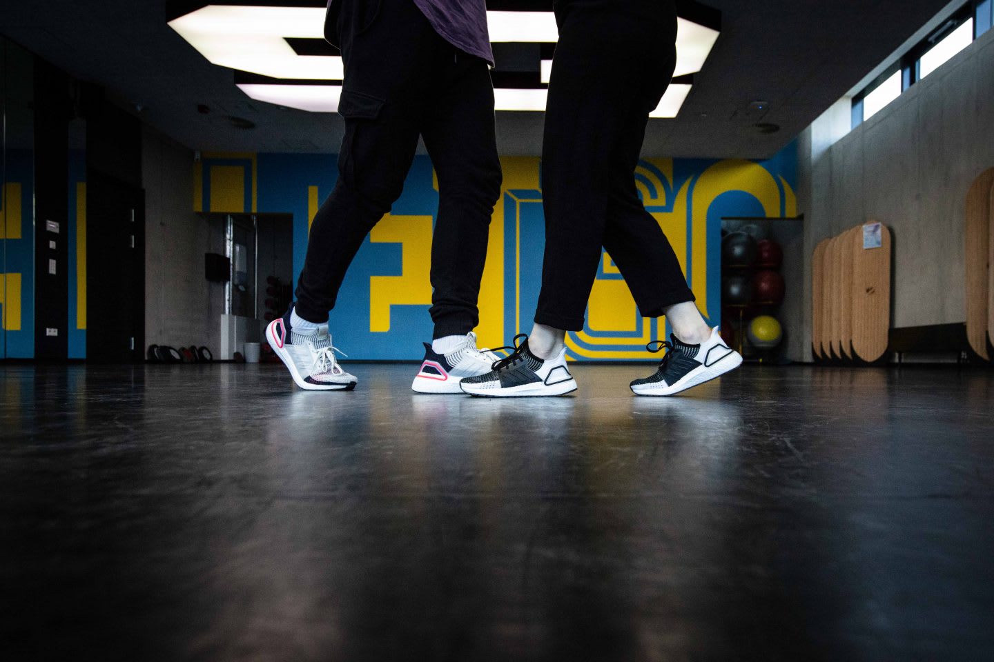 A couple dancing in closed dancing posture, close-up on the feet. Couple dance, lead, follow, guiding, collaboration, GamePlan A