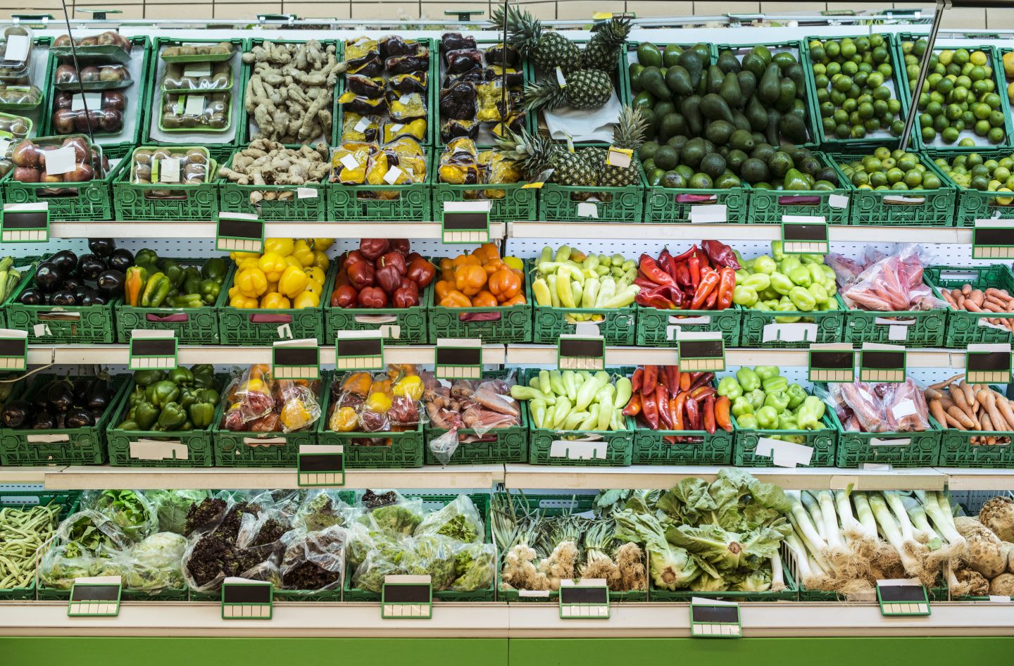 Stand with fruits and vegetables in the supermarket. Nutrition is very important when running a marathon. GamePlan A