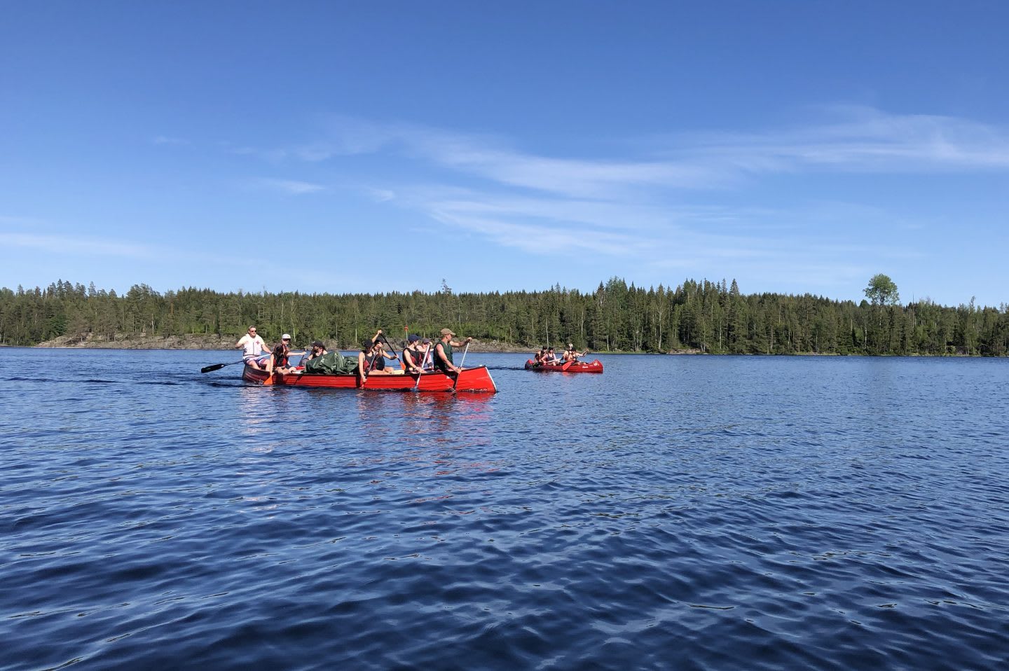 Six people in a canoe.