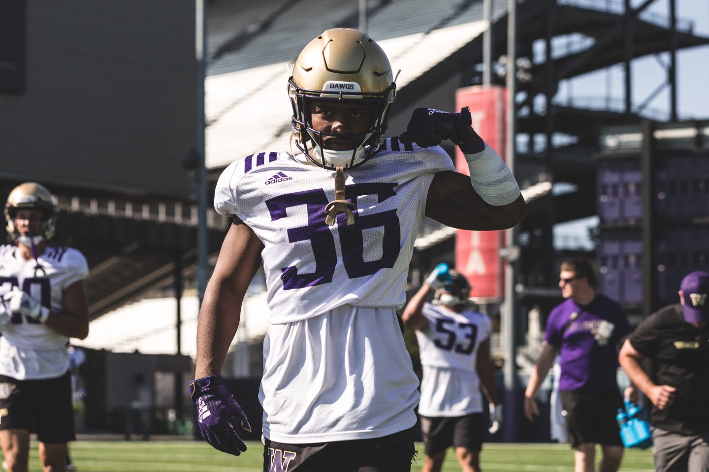 american football player walking on pitch