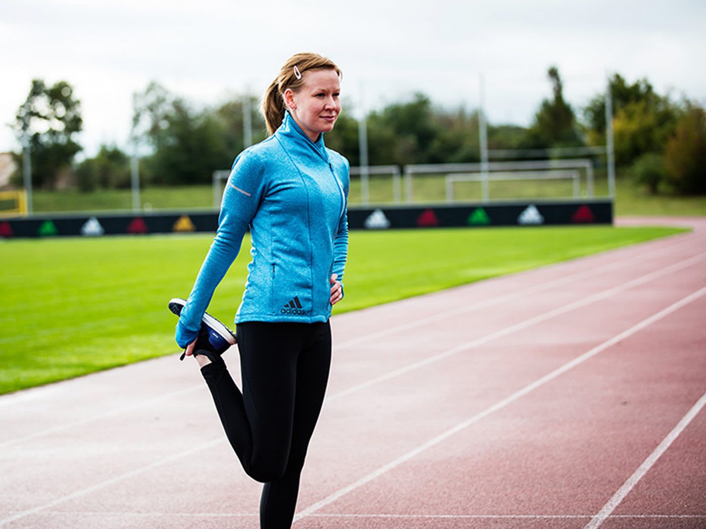 Female stretching on a running track. Dealing with grief. mindfulness, grief, self-reflection, GamePlan A.