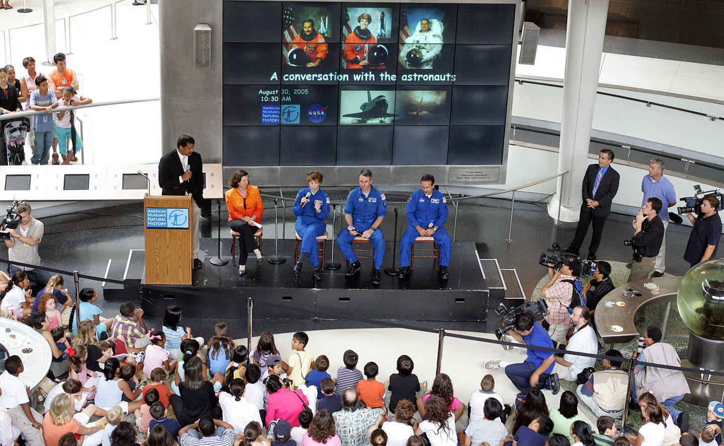 NASA astronauts in a talk round sitting on a podium in front of a crowd. diversity, innovation, creativity, team work, GamePlanA