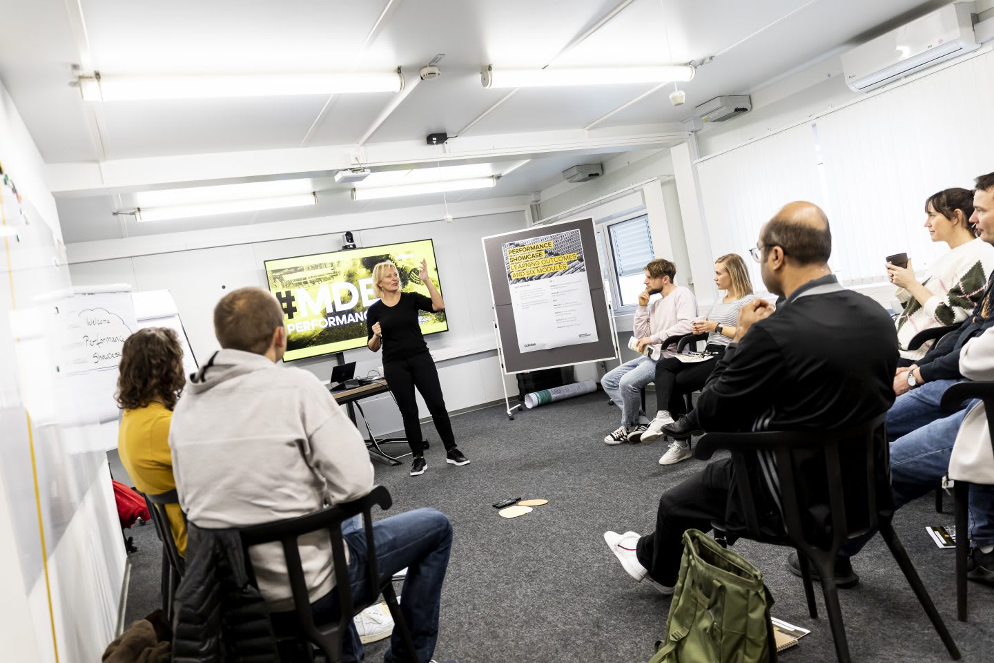 employees taking part in a lesson or workshop, Performance Culture