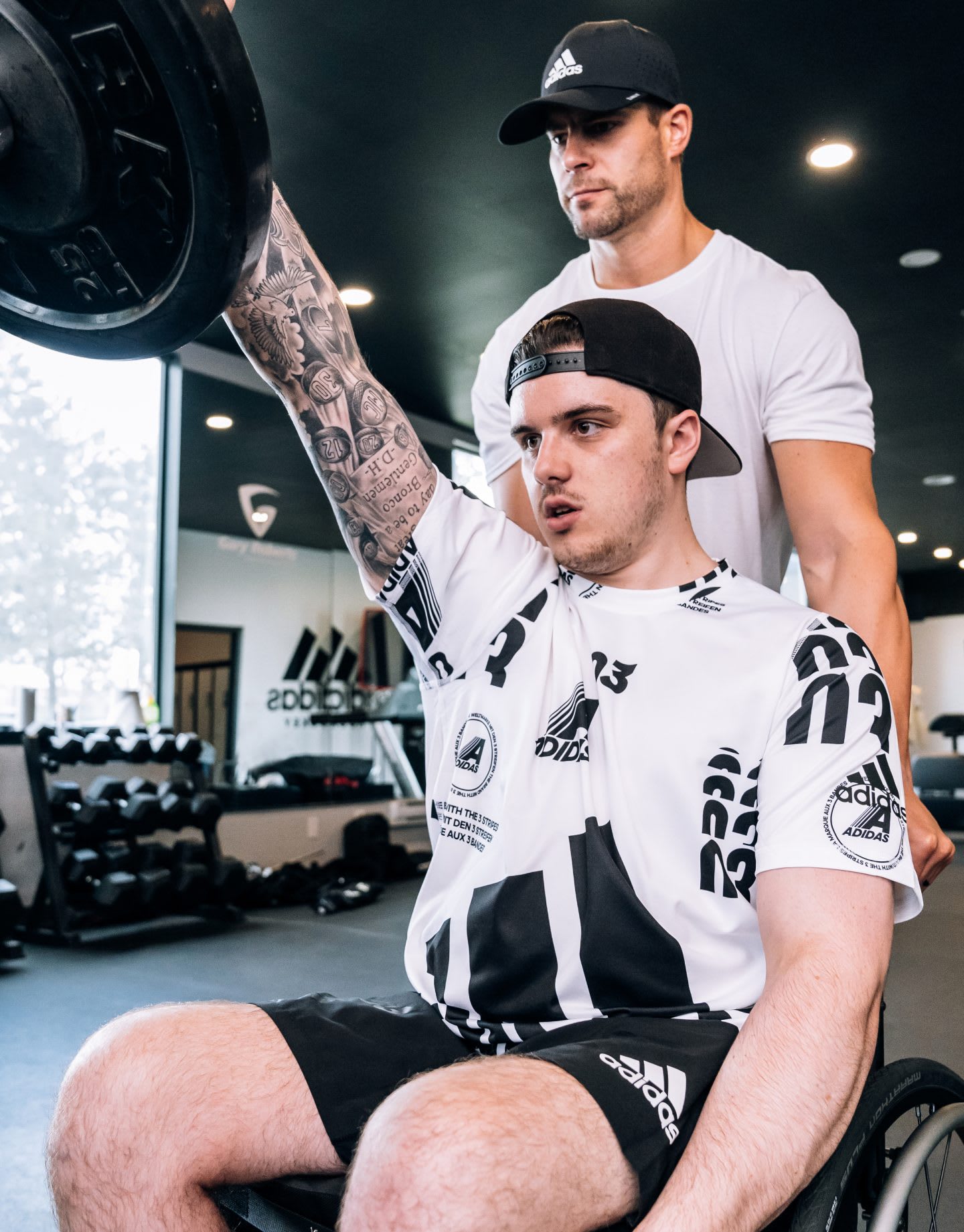 a disabled hockey player in a wheelchair exercising, paralyzed hockey player