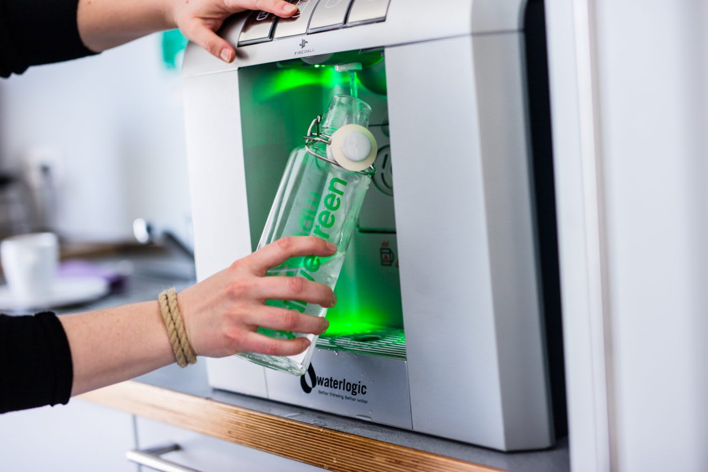 Glass bottle filled up at water station. avoid plastic, sustainability, habits and routines, inspiration, GamePlan A.