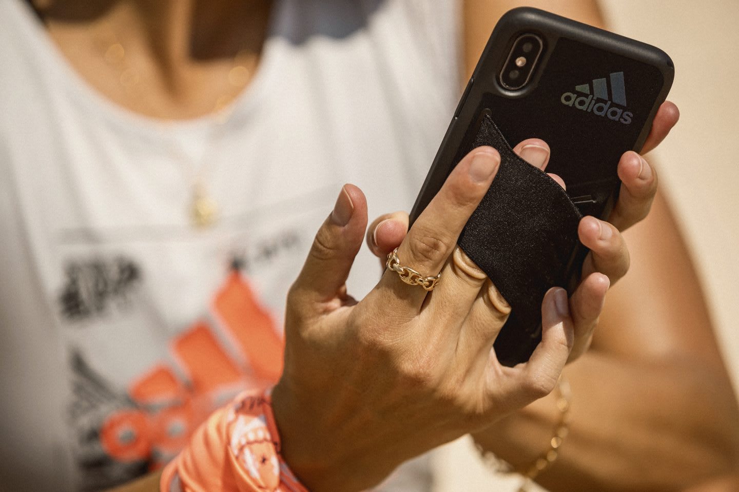 Female athlete working out while listening to podcast adidas phone case, fitness, sports, adidas, accessory