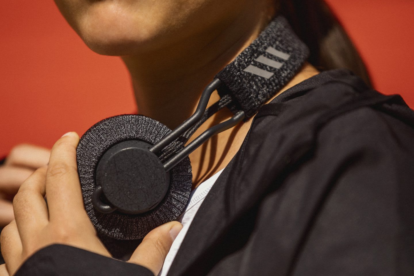 Female athlete working out while listening to podcast adidas headphones, adidas, headphones, accessory, listening