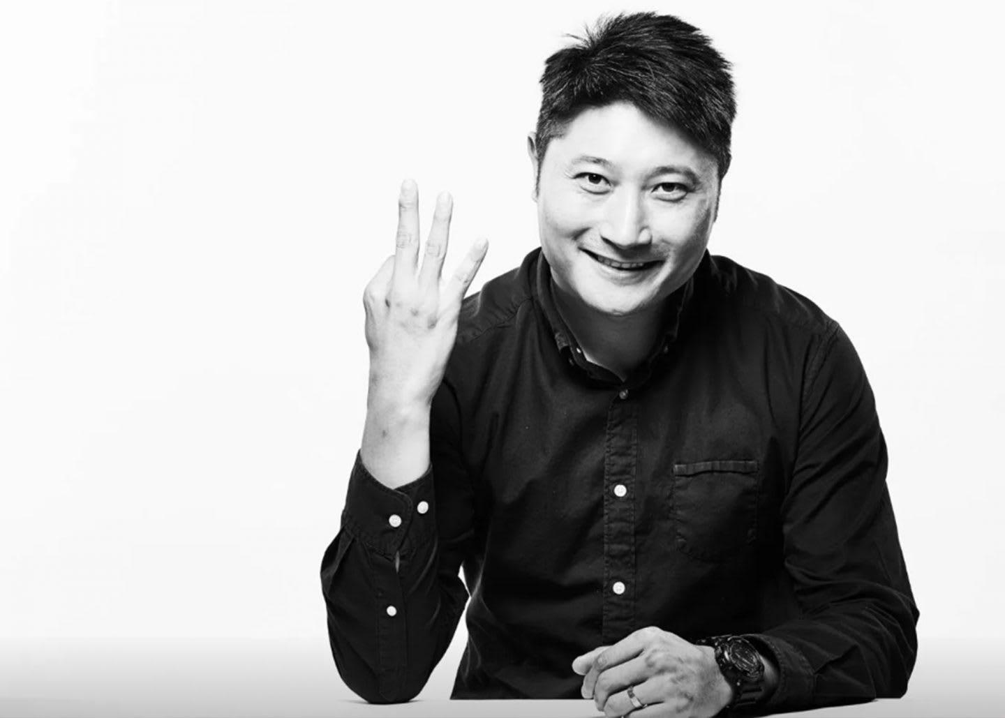 man smiling pointing three fingers jack wu working abroad dream career