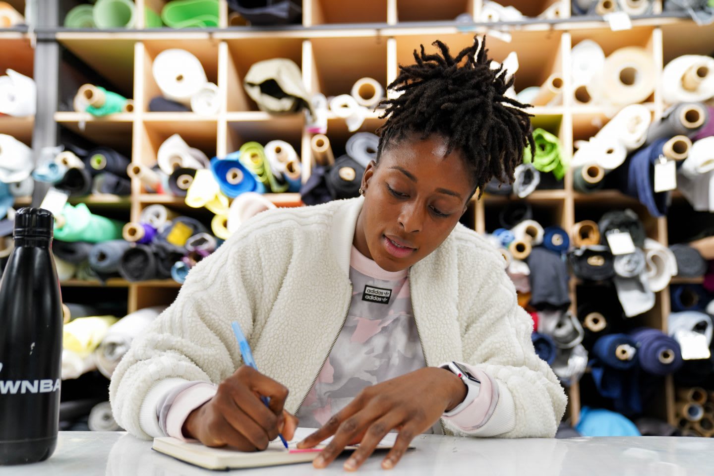 WNBA player Nneka Ogwumike writing ideas in notebook, adidas, office, creativity, work, ideas, GamePlan A