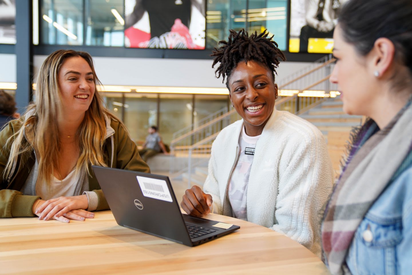 WNBA player Nneka Ogwumike discusses ideas with colleagues in the workplace, adidas, teamwork, teammates, office, collaboration, creativity, GamePlan A
