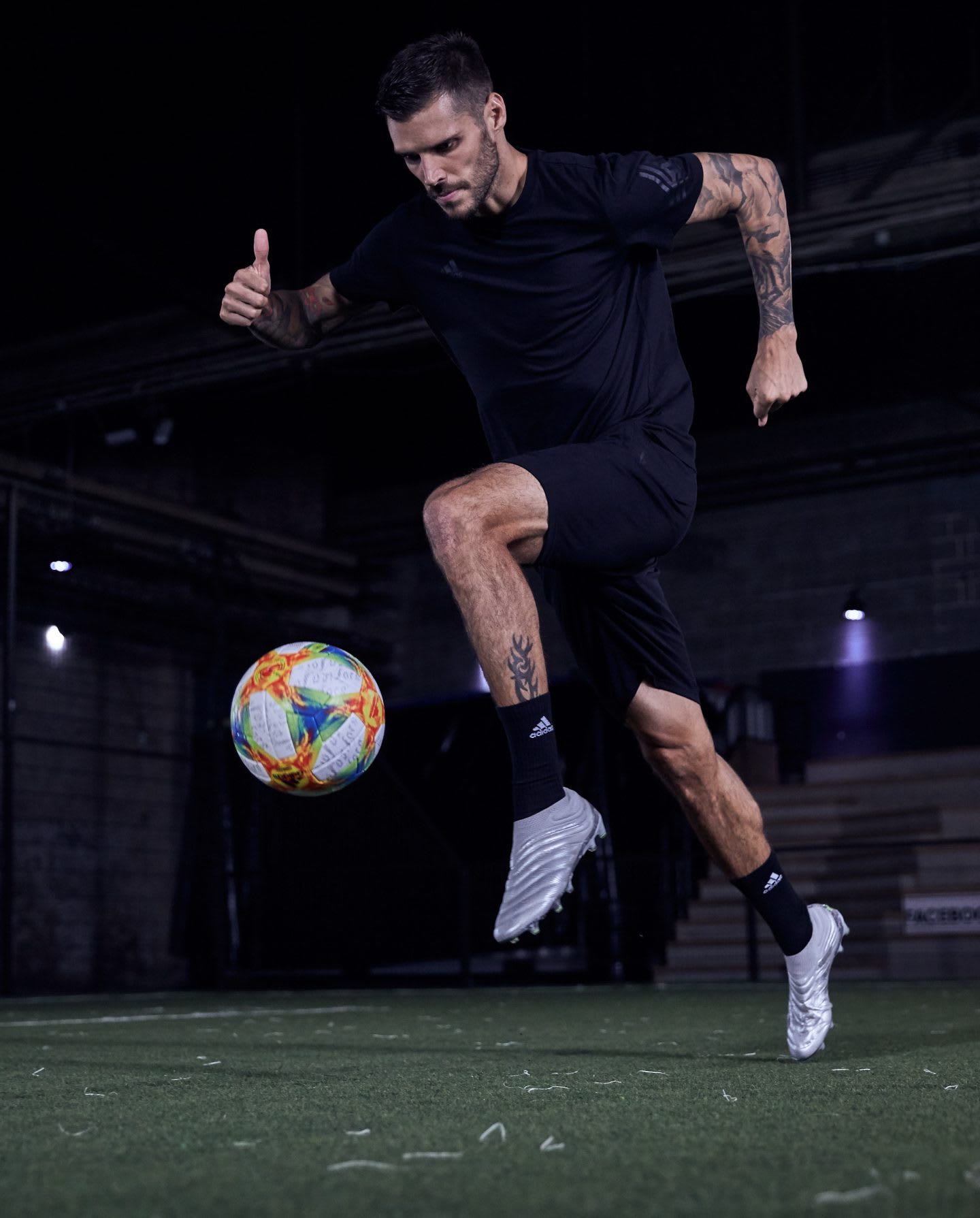 Christopher Trimmel handling a football while sprinting forward.
