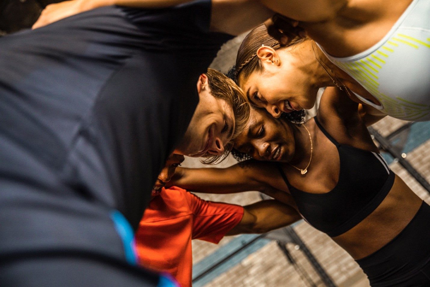 Men and women training indoors. accountability partner, GamePlanA