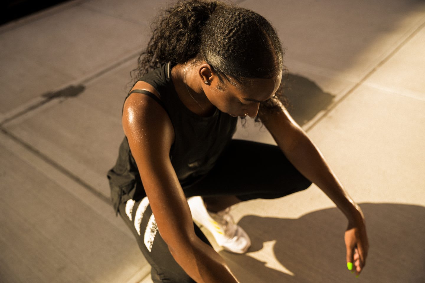Woman resting after running in black adidas running clothes, workout, fitness, sports, active, adidas