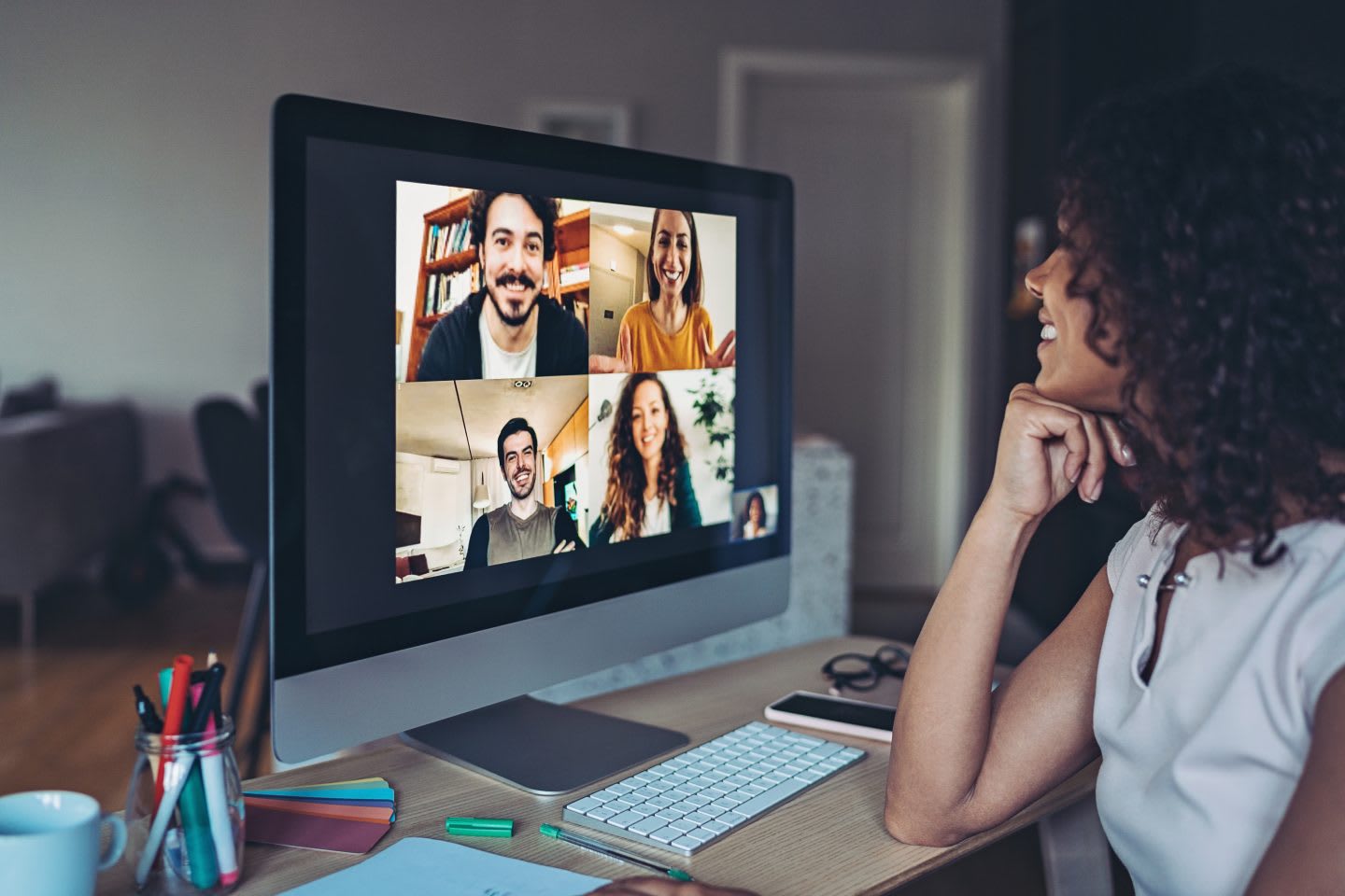 Group of people having a video conference through a desktop computer, remote working, home office, digital, technology, team, connection, online, meeting, business