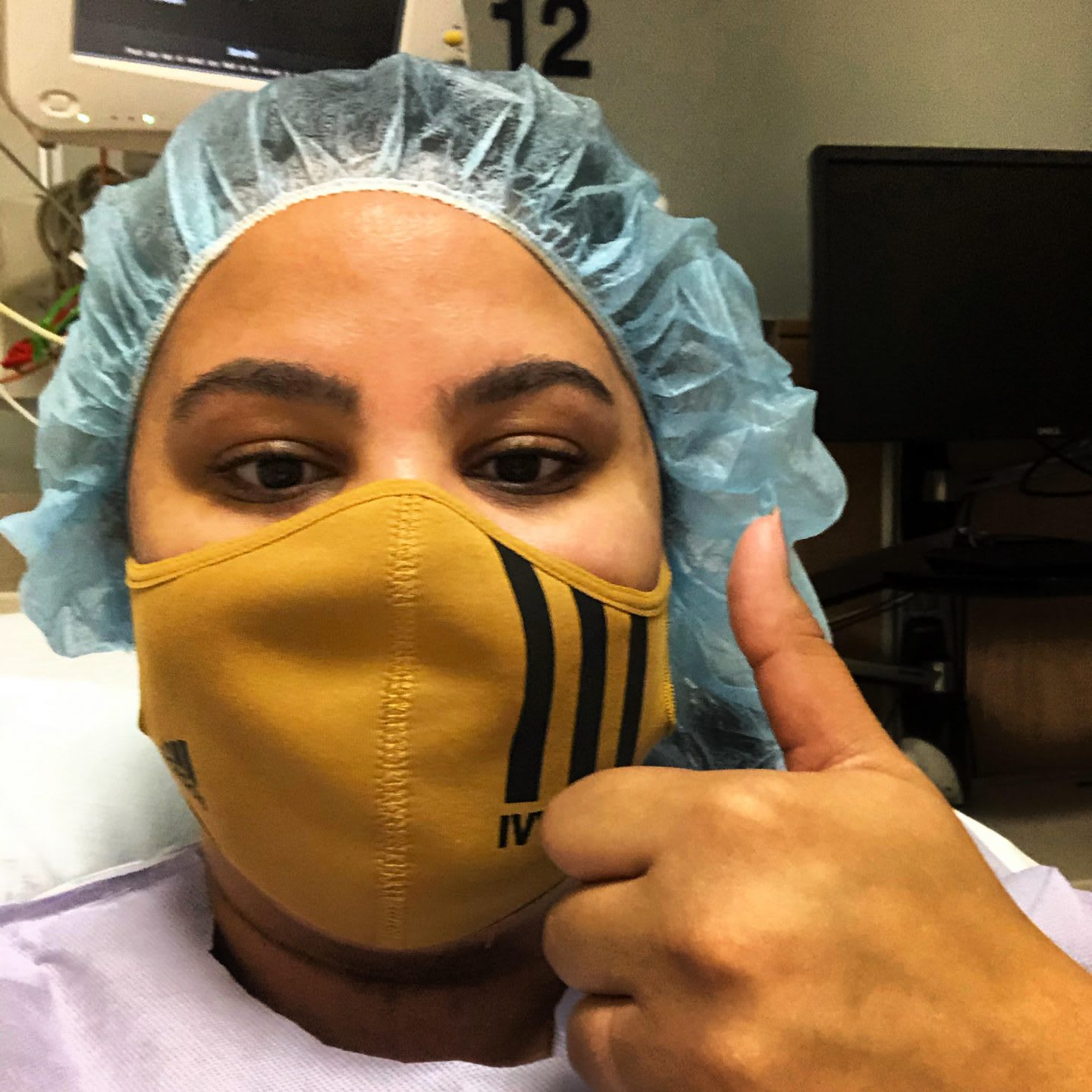 Girl wearing mask in surgery cap and gown during surgery, Jasmine Goodwin, adidas, employee, body, positivity