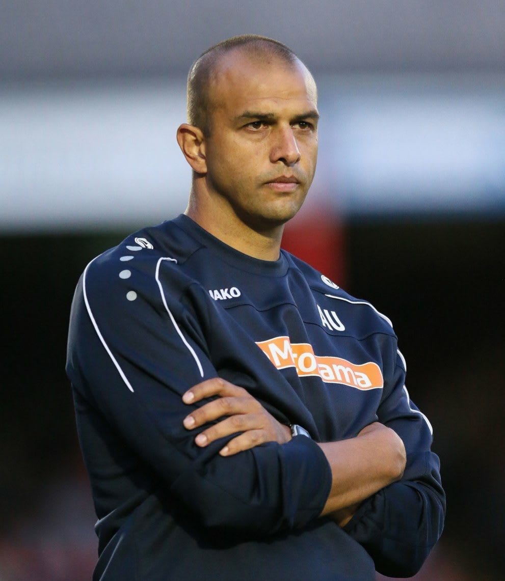 Fans for Diversity chief Anwar Uddin standing with arms crossed, football, diversity, man