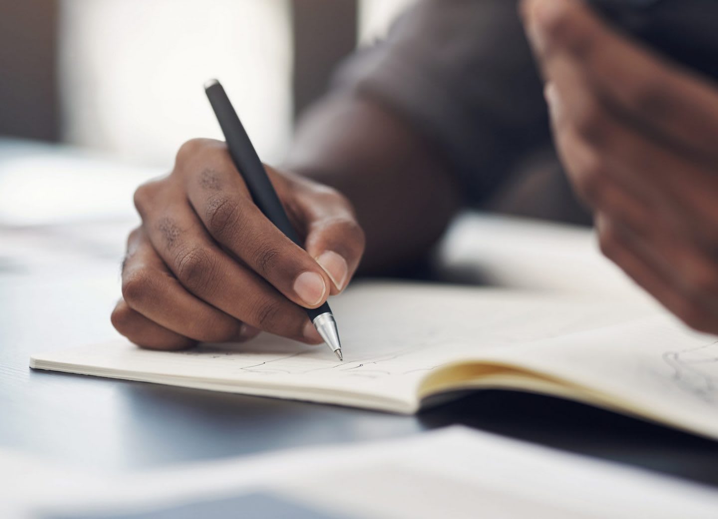close up of person writing in a notebook, creativity, ideas, mindful, imagination