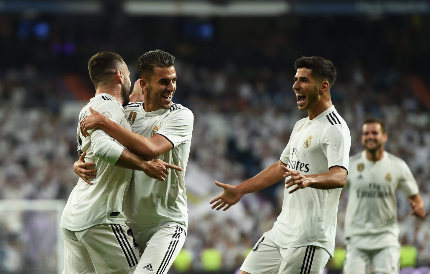 Marco Asensio celebrating in stadium