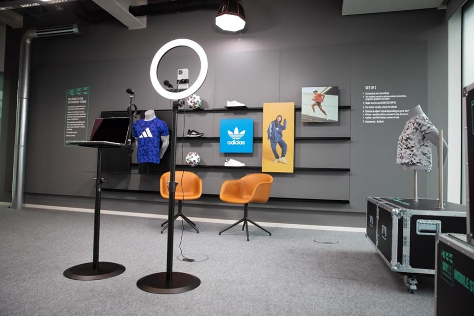 An innovative DIY studio at the adidas office with microphones lights and chairs