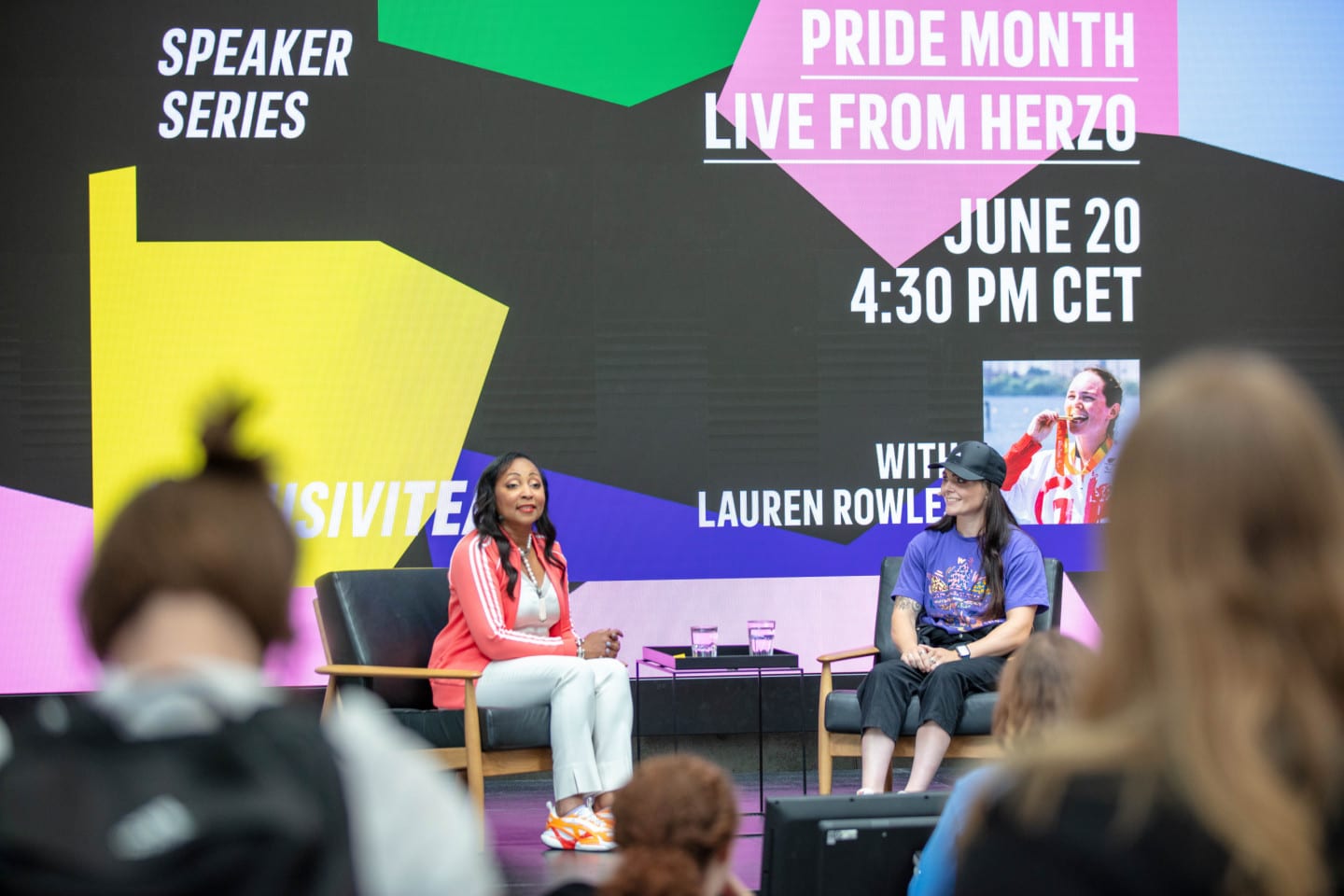 People discussing inclusivity in adidas' headquarters