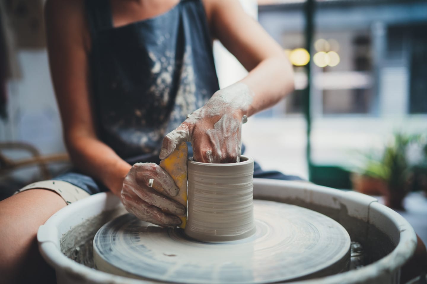 Someone making a clay sculpture