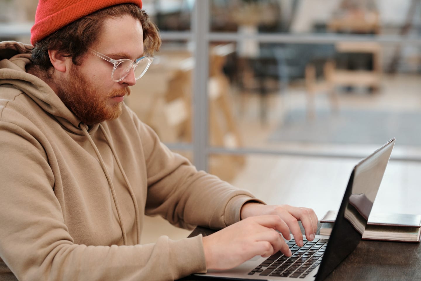Man working on his laptop in a study area