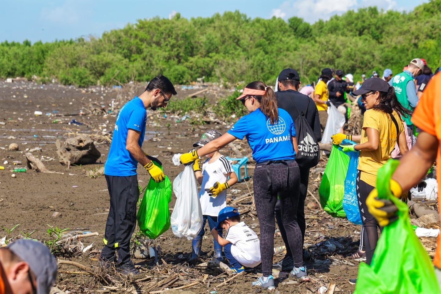Children helping to collect plastic waste