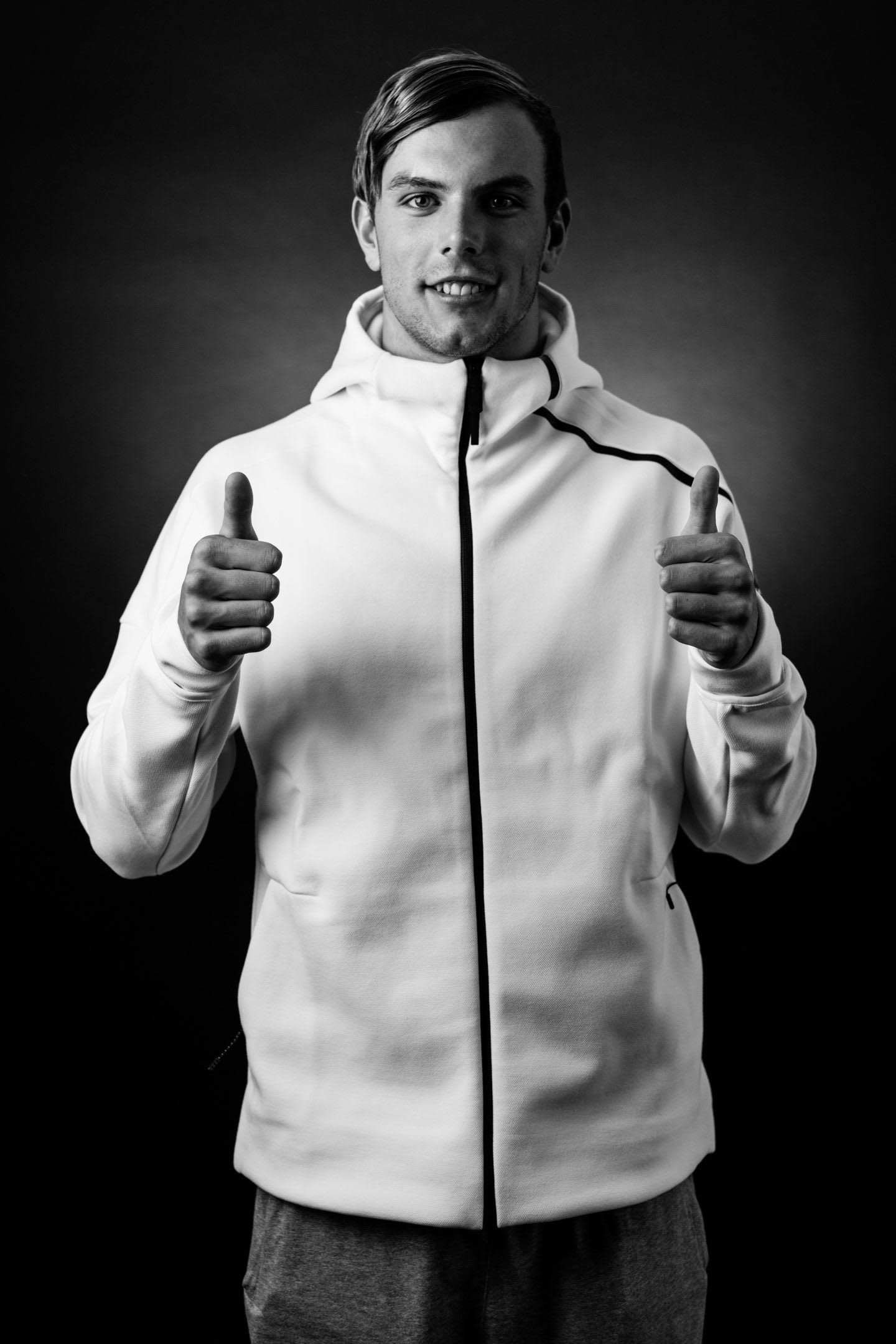 man holding thumbs up kyle chalmers olympic champion