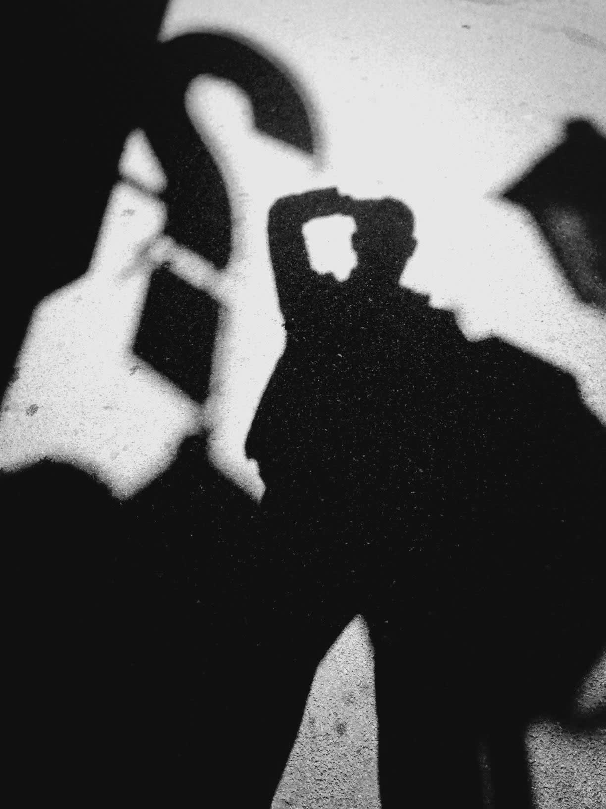 man looking at his shadow and a question mark habit change
