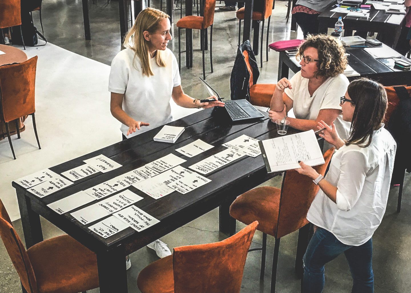 women discussing and working together hacking your way to innovation