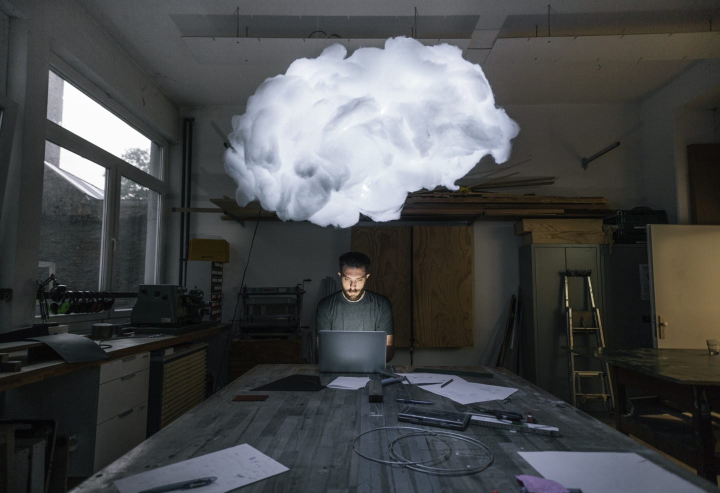 man working with cloud over his head hacking your way to innovation