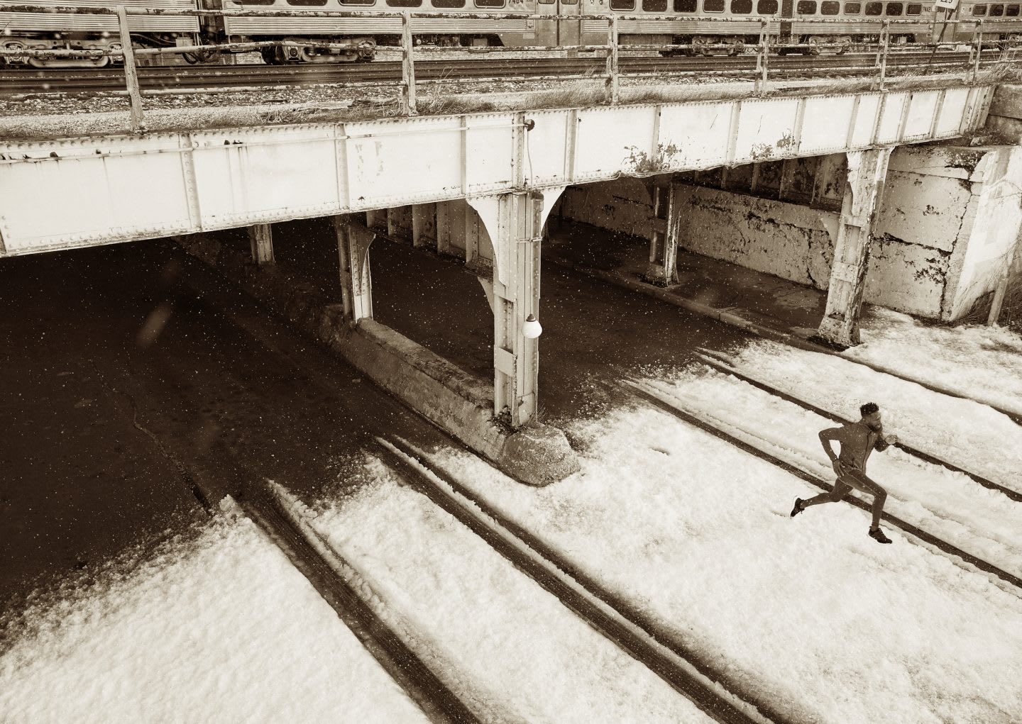 man running under a bridge research holding you back from achieving goals