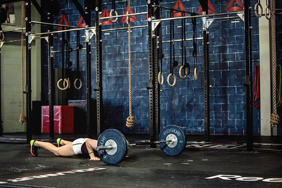 Reebok, woman working out in CrossFit box, woman with weights, weightlifting mirror free