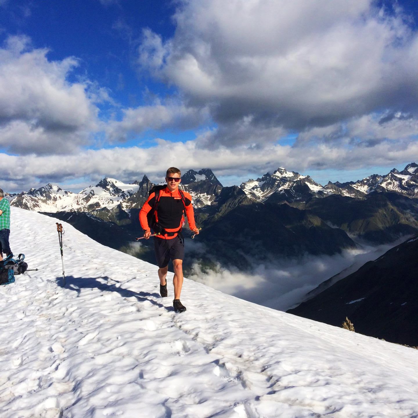 man on a mountain in the snow marcel hoeche working less boosts career