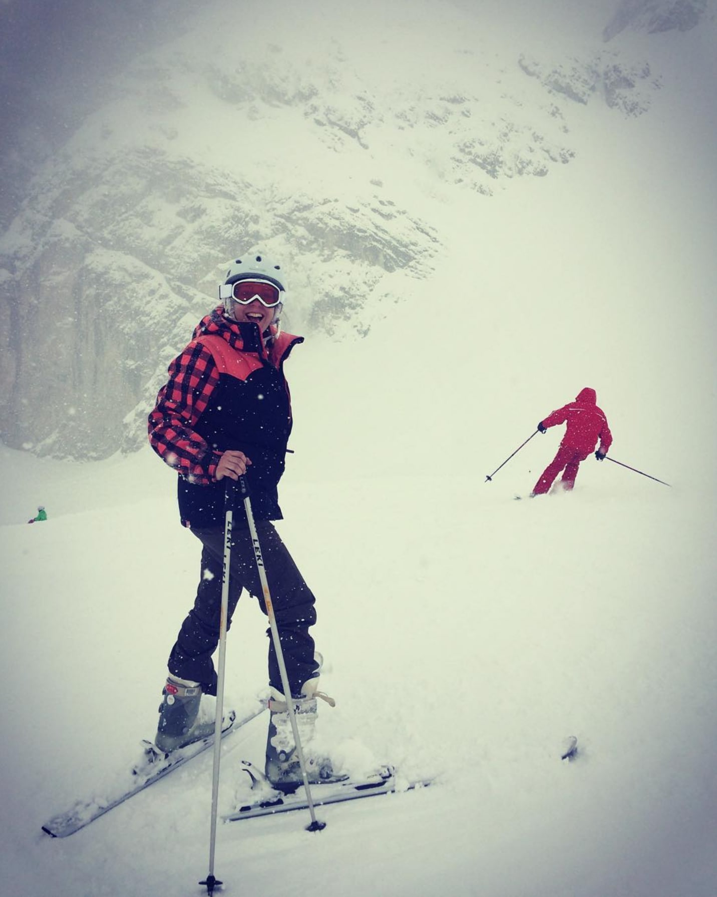 Janine Feirer skiing in the mountains
