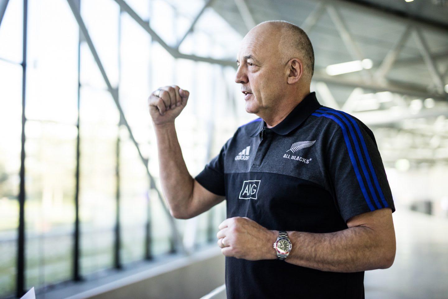 Man gesturing during interview adidas All Blacks Mental Coach Gilbert Enoka talking mental strength vulnerability team spirit